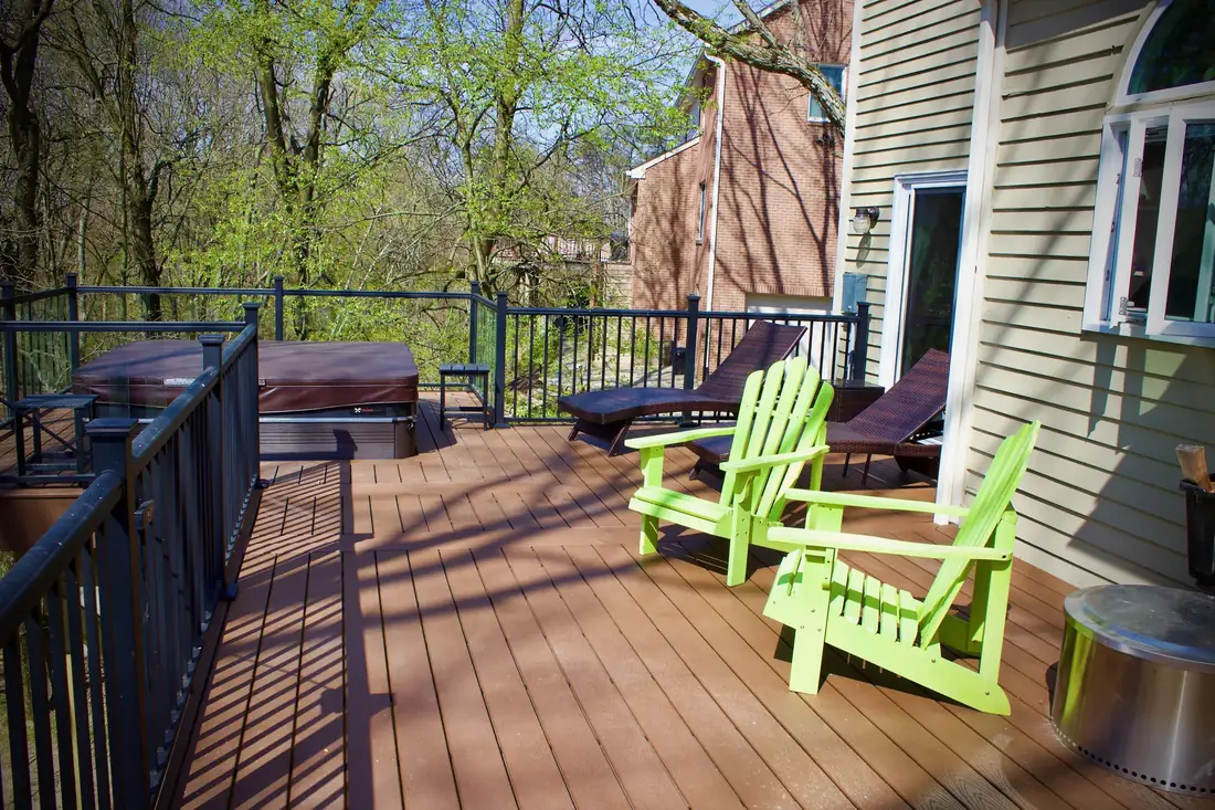 Hot tub deck with Adirondack seating — Oasis Custom Decks