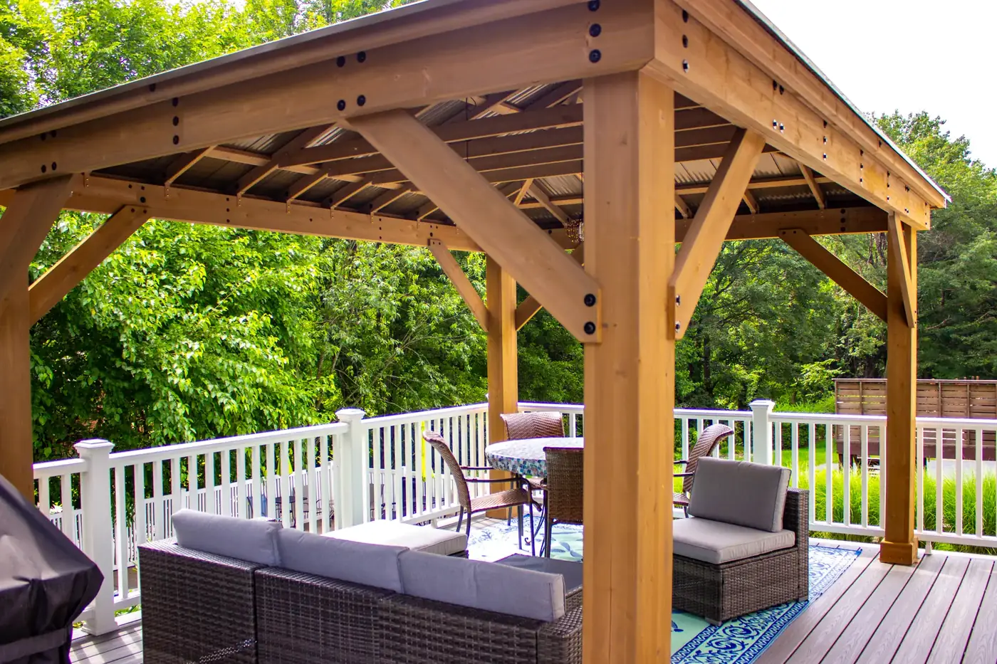 Cedar pergola over the lower deck — Oasis Custom Decks