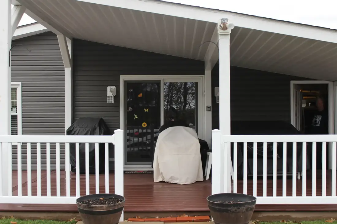 Covered porch with white rail — Oasis Custom Decks