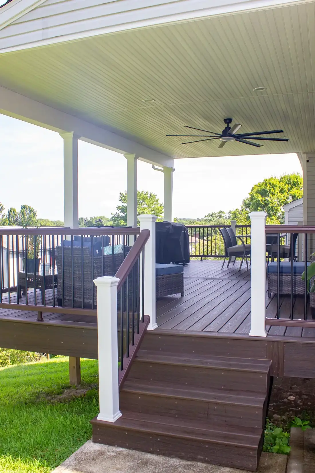 Ceiling fan and privacy curtain corner — Oasis Custom Decks