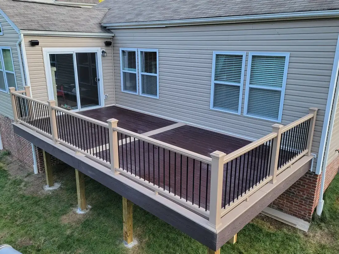 Wood-post rail with black balusters — Oasis Custom Decks