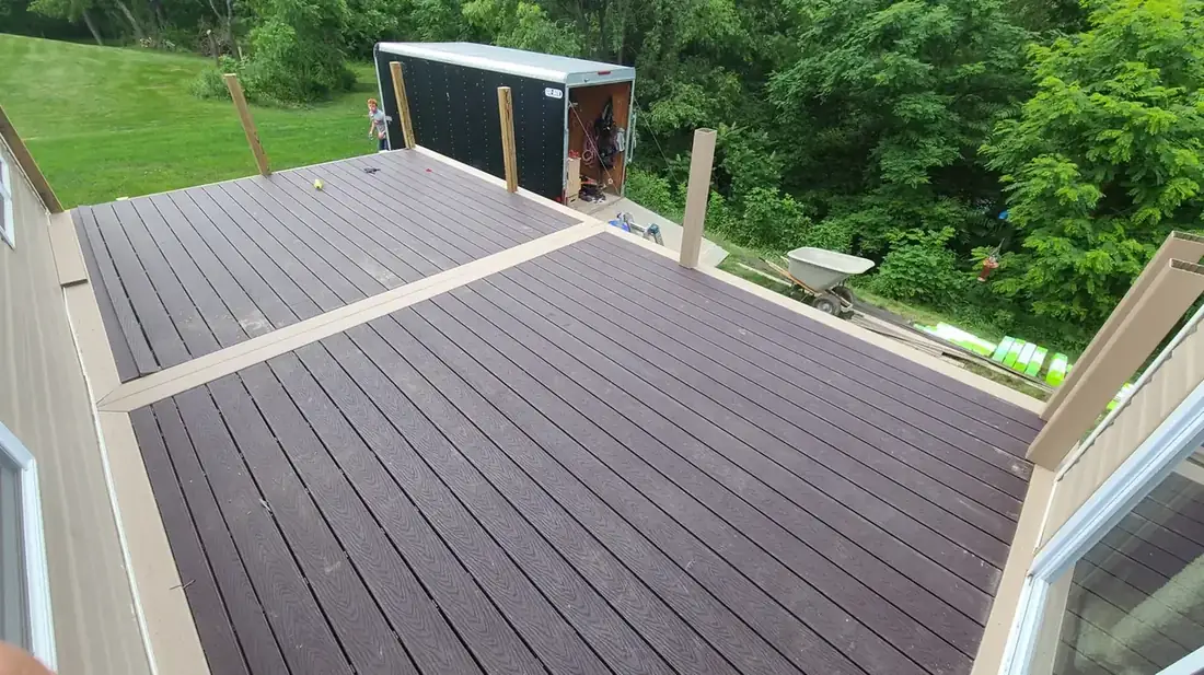 Dark composite surface, breaker board — Oasis Custom Decks