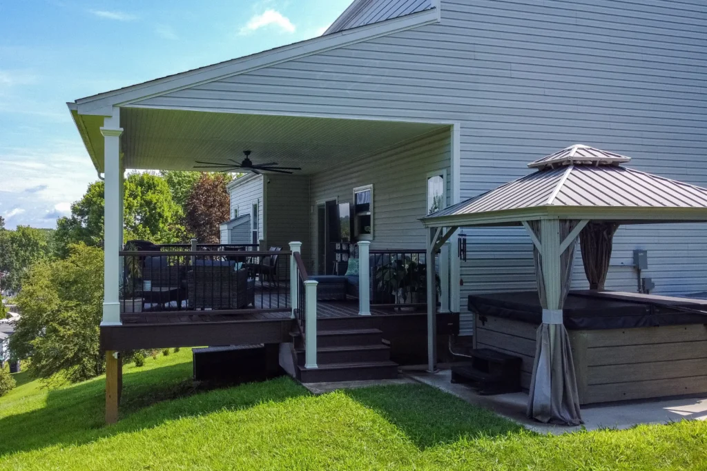 Photo of a covered deck with furniture