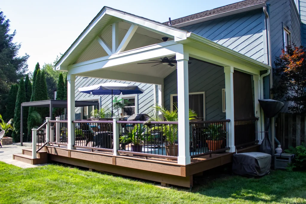 Photo of a beach-style deck showing the entire deck along with its furniture and roof