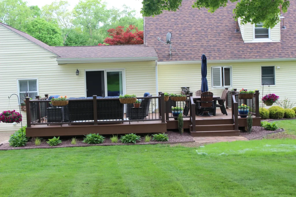 Photo of a fully furnished deck with sofas and a table for activities