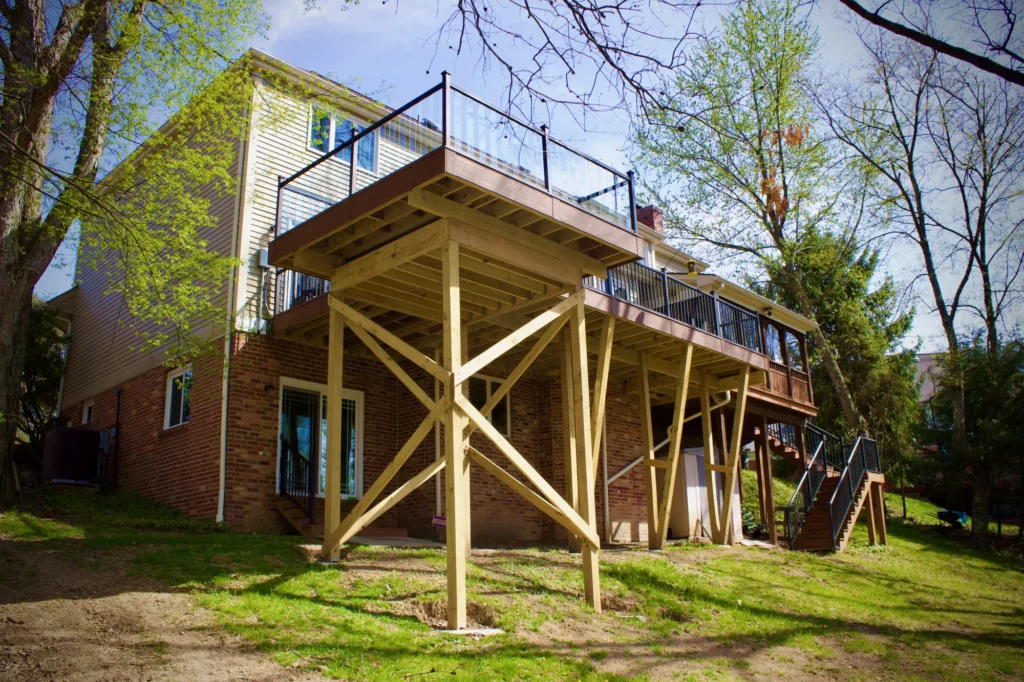 Photo of a raised deck, showing the wooden posts that support it