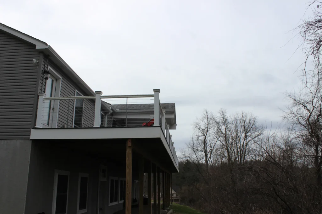 Photo of a raised deck showing the wooden posts that support the structure