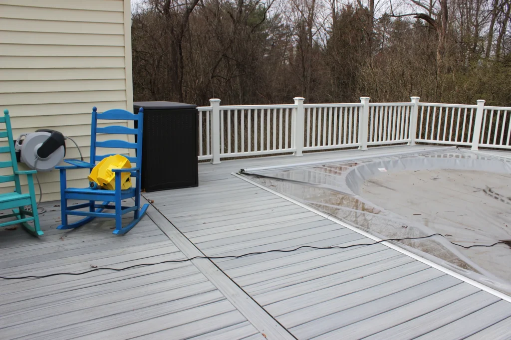 A closer look at what a deck installed around a pool looks like