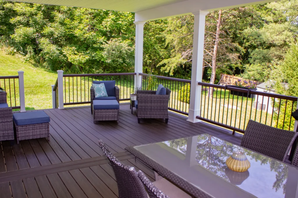 Photo of a covered deck showing that it has furniture