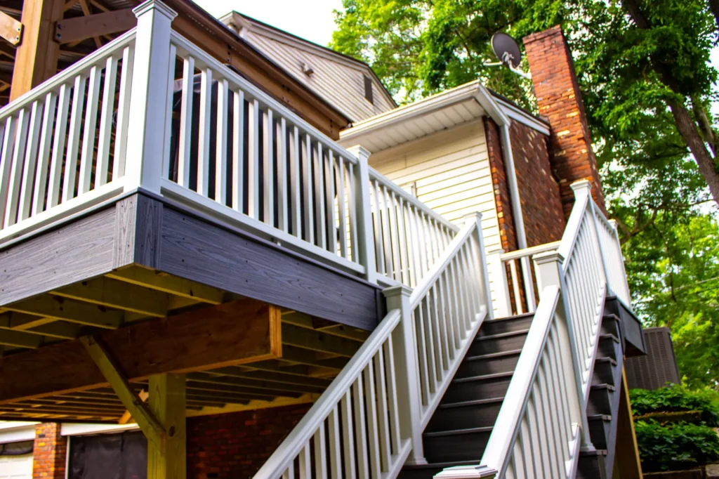 Photo showing wooden stairs leading to a raised deck