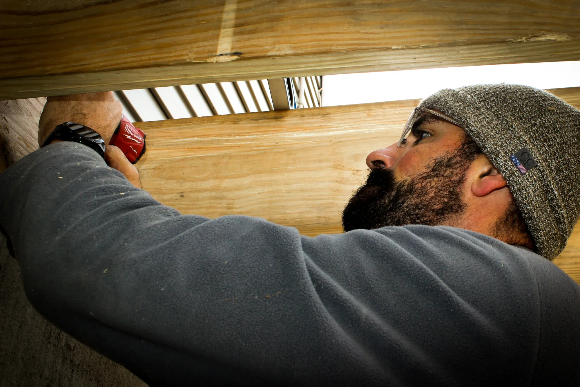 Worker working on a deck
